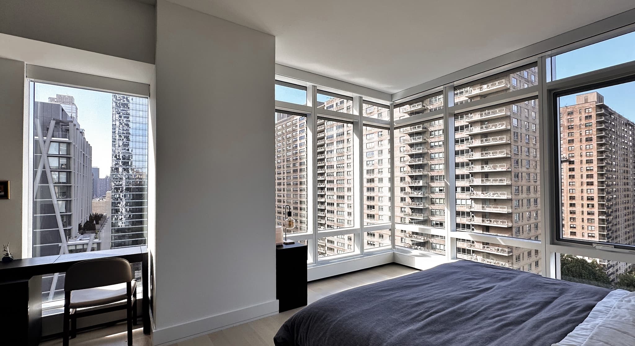 Whisper Windows inserts installed on a floor-to-ceiling corner window